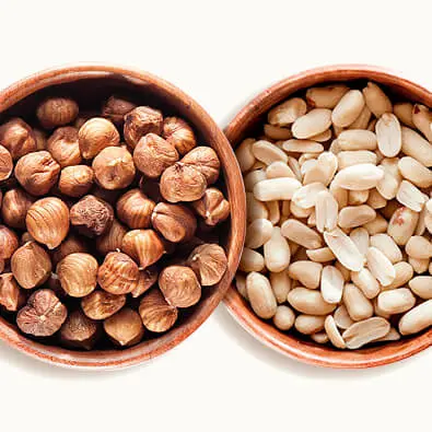 Hazelnuts and peanuts in a plate